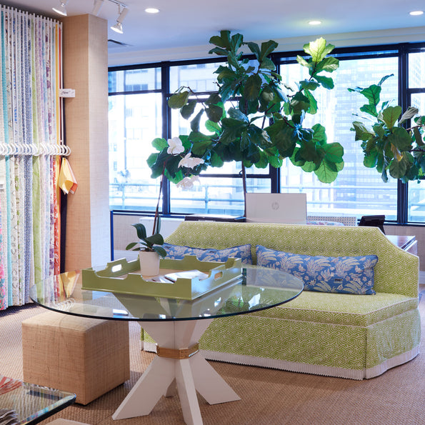 Green bespoke couch displayed at oomph's trade showroom in NYC.