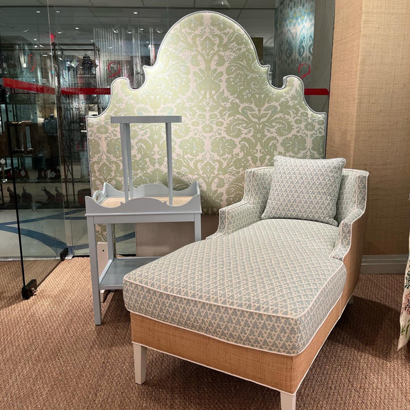 Custom bed, headboard, and side tables on display at the oomph NYC showroom.