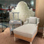 Custom bed, headboard, and side tables on display at the oomph NYC showroom.